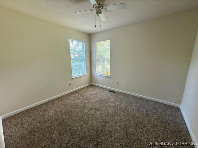 868 E St, Lebanon, MO 65536 - spare room featuring carpet floors and a ceiling fan
