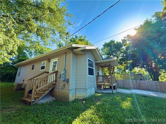 868 E St, Lebanon, MO 65536 - view of property exterior with a central AC unit