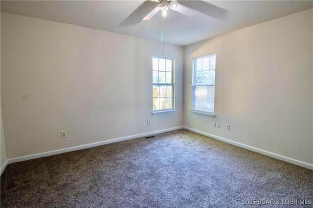 868 E St, Lebanon, MO 65536 - carpeted spare room with a ceiling fan and baseboards