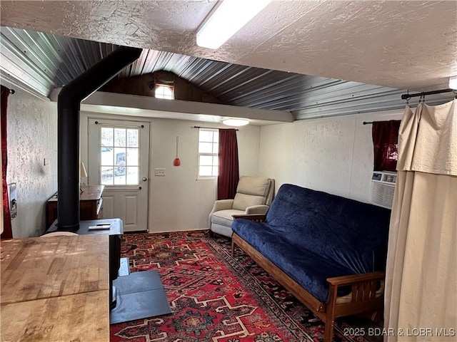 31475 Ivy Bend Rd, Stover, MO 65078 - living area with lofted ceiling, carpet flooring, and a wood stove
