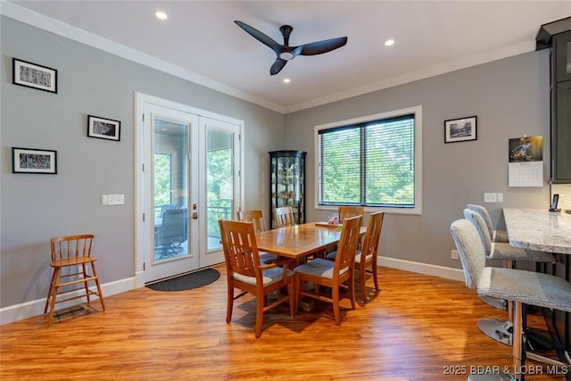87 Glenmeadows Ct, Linn Creek, MO 65052 - dining area featuring crown molding, a ceiling fan, light wood-style flooring, recessed lighting, and french doors