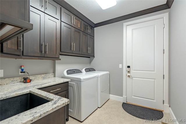 87 Glenmeadows Ct, Linn Creek, MO 65052 - laundry area featuring cabinet space and washer and dryer