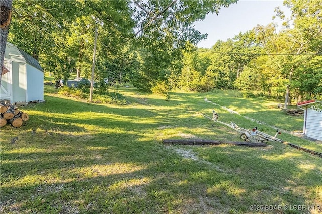 4230 Fox Hollow Ln, Stover, MO 65078 - view of grassy yard with a storage unit