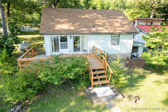 4230 Fox Hollow Ln, Stover, MO 65078 - view of front of home featuring roof with shingles, a deck, and stairway