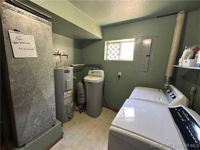 30024 Hawaii Rd, Gravois Mills, MO 65037 - laundry area featuring washing machine and clothes dryer, electric water heater, electric panel, light floors, and a textured ceiling