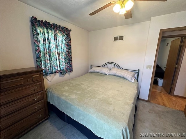 30024 Hawaii Rd, Gravois Mills, MO 65037 - bedroom featuring light colored carpet and a ceiling fan