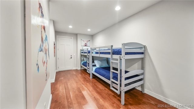 777 Malibu Rd, Osage Beach, MO 65065 - bedroom featuring wood finished floors and recessed lighting