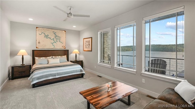 777 Malibu Rd, Osage Beach, MO 65065 - carpeted bedroom with a water view, recessed lighting, and ceiling fan
