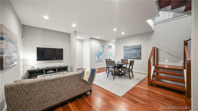 777 Malibu Rd, Osage Beach, MO 65065 - living room featuring stairway, wood finished floors, and recessed lighting