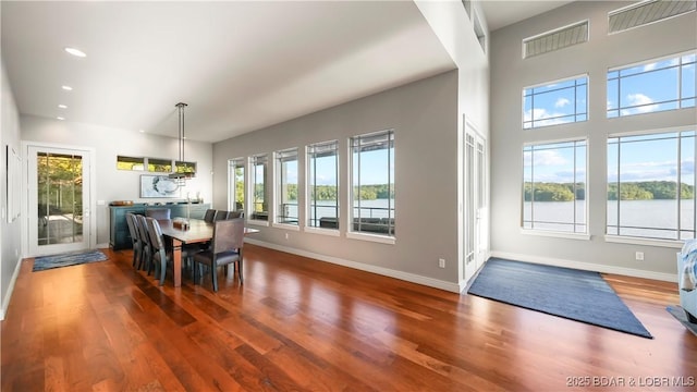 777 Malibu Rd, Osage Beach, MO 65065 - dining room with plenty of natural light, wood finished floors, and recessed lighting