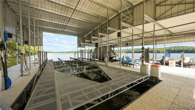 777 Malibu Rd, Osage Beach, MO 65065 - dock area featuring boat lift and a water view