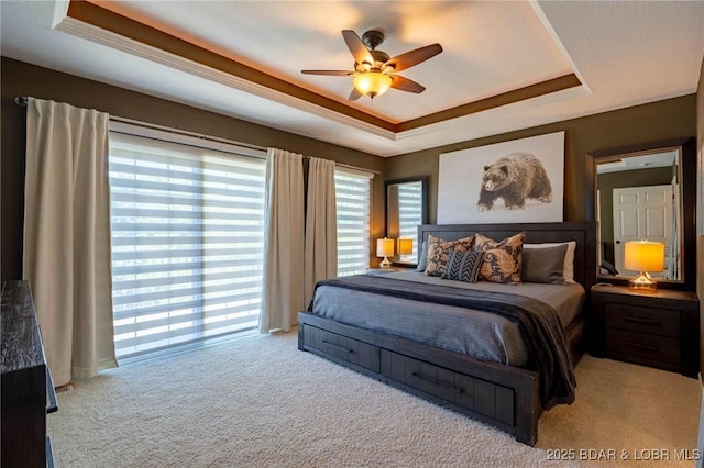 30310 Old Peony Rd, Gravois Mills, MO 65037 - bedroom with a raised ceiling, carpet flooring, and ceiling fan