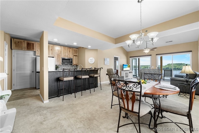 708 Harbour Towne Dr Unit E-708, Lake Ozark, MO 65049 - dining area with a chandelier, light carpet, and recessed lighting