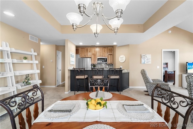 708 Harbour Towne Dr Unit E-708, Lake Ozark, MO 65049 - dining area with light colored carpet, a chandelier, and recessed lighting