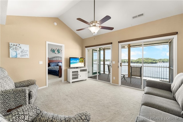 708 Harbour Towne Dr Unit E-708, Lake Ozark, MO 65049 - living room featuring a ceiling fan, light colored carpet, and high vaulted ceiling