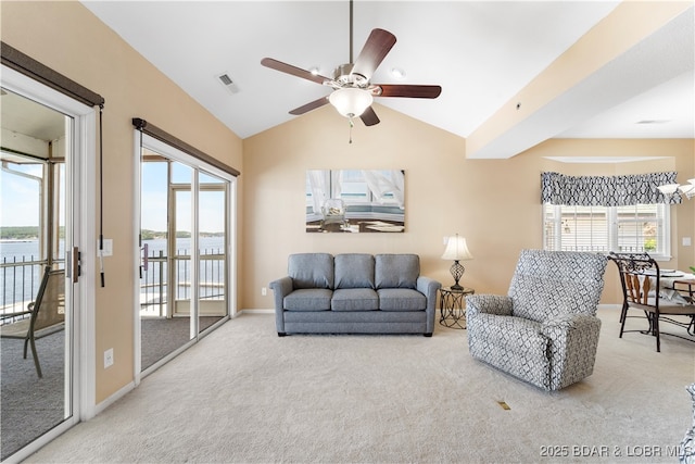 708 Harbour Towne Dr Unit E-708, Lake Ozark, MO 65049 - living room featuring carpet, ceiling fan, vaulted ceiling, and a water view