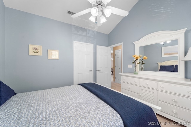 708 Harbour Towne Dr Unit E-708, Lake Ozark, MO 65049 - bedroom with high vaulted ceiling, a ceiling fan, and light colored carpet