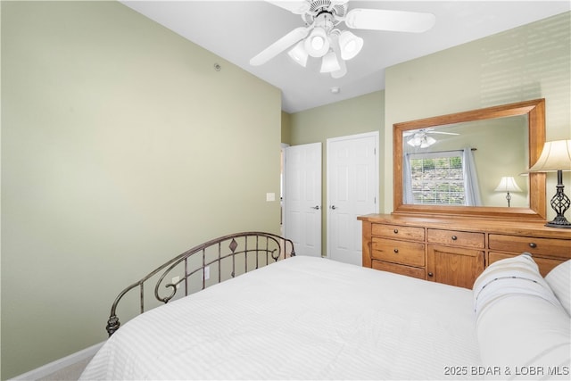 708 Harbour Towne Dr Unit E-708, Lake Ozark, MO 65049 - bedroom with a ceiling fan and carpet flooring