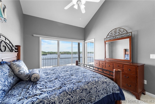 708 Harbour Towne Dr Unit E-708, Lake Ozark, MO 65049 - bedroom with access to exterior, a water view, high vaulted ceiling, carpet floors, and a ceiling fan
