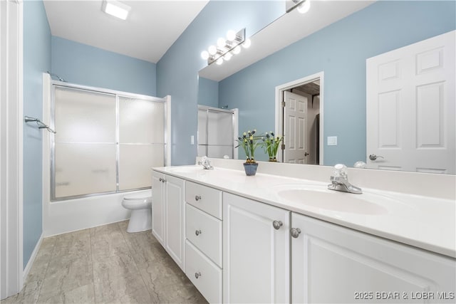 708 Harbour Towne Dr Unit E-708, Lake Ozark, MO 65049 - full bathroom featuring double vanity and combined bath / shower with glass door