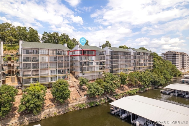 708 Harbour Towne Dr Unit E-708, Lake Ozark, MO 65049 - view of apartment building / complex with a water view