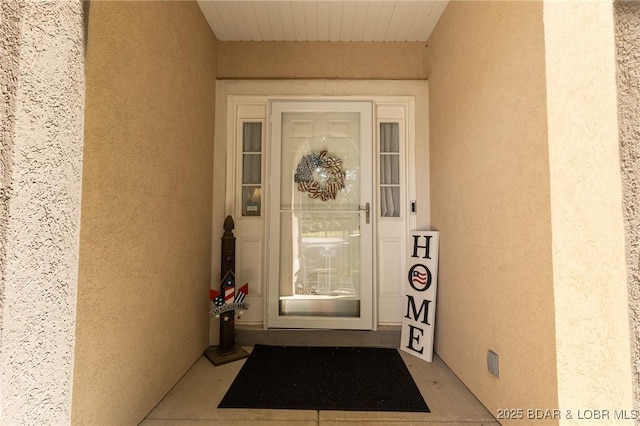 4331 Sunset Dr Unit B, Osage Beach, MO 65065 - property entrance featuring stucco siding