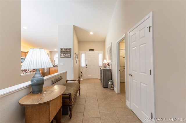 4331 Sunset Dr Unit B, Osage Beach, MO 65065 - hallway with light tile patterned floors and recessed lighting