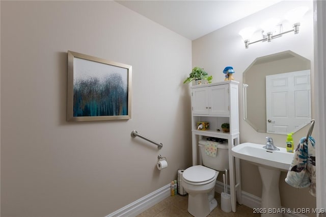4331 Sunset Dr Unit B, Osage Beach, MO 65065 - bathroom with toilet and tile patterned floors