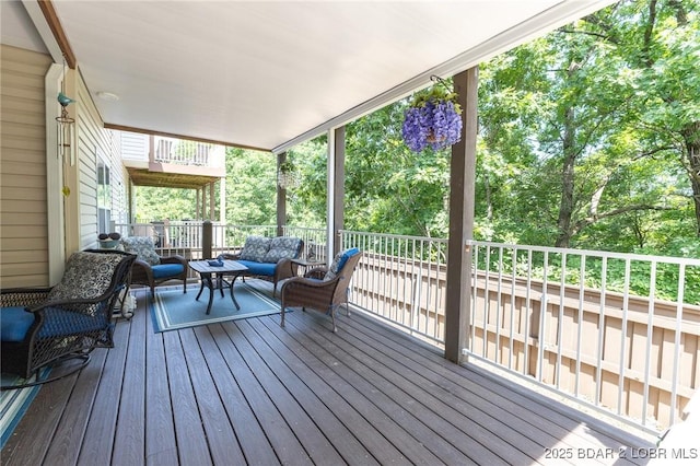 4331 Sunset Dr Unit B, Osage Beach, MO 65065 - deck featuring an outdoor living space
