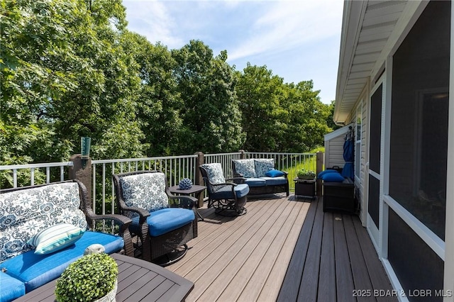 4331 Sunset Dr Unit B, Osage Beach, MO 65065 - wooden deck featuring an outdoor hangout area