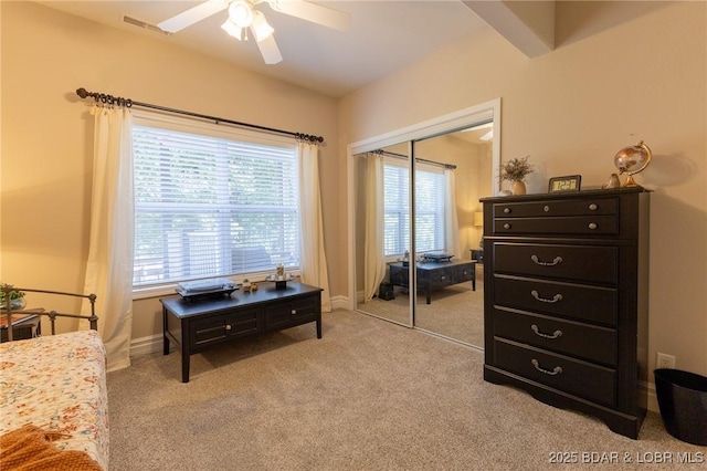 4331 Sunset Dr Unit B, Osage Beach, MO 65065 - bedroom with light carpet, a closet, and ceiling fan
