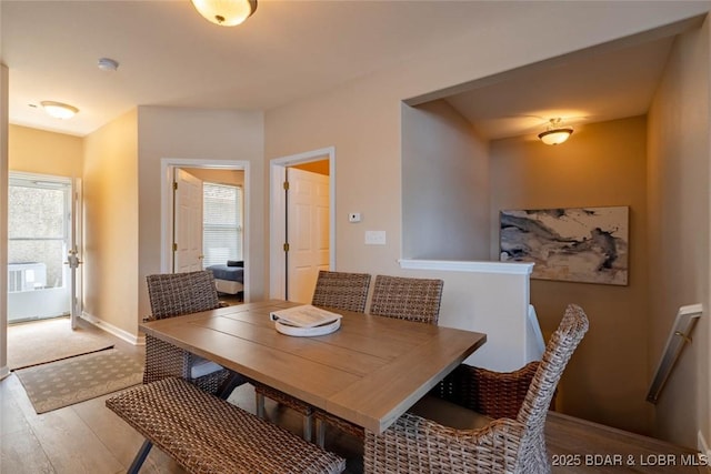275 Flynn Rd Unit 105, Lake Ozark, MO 65049 - dining room with wood finished floors and baseboards