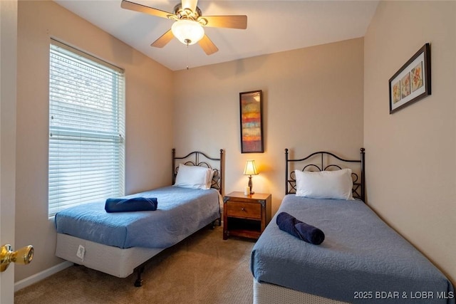 275 Flynn Rd Unit 105, Lake Ozark, MO 65049 - carpeted bedroom featuring ceiling fan and baseboards