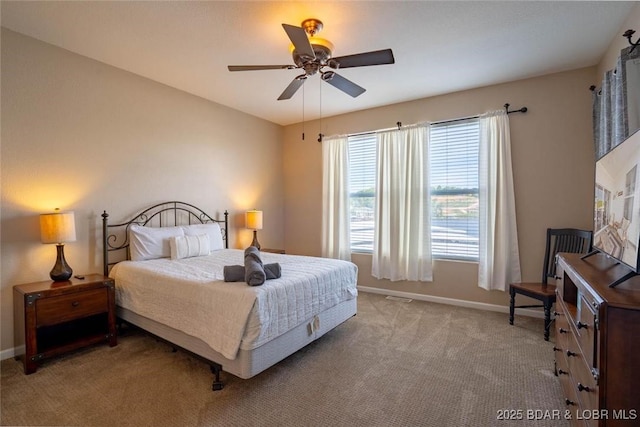 275 Flynn Rd Unit 105, Lake Ozark, MO 65049 - bedroom with light carpet and a ceiling fan