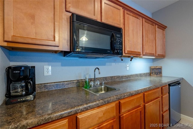 275 Flynn Rd Unit 105, Lake Ozark, MO 65049 - kitchen with black microwave, dark countertops, and brown cabinetry
