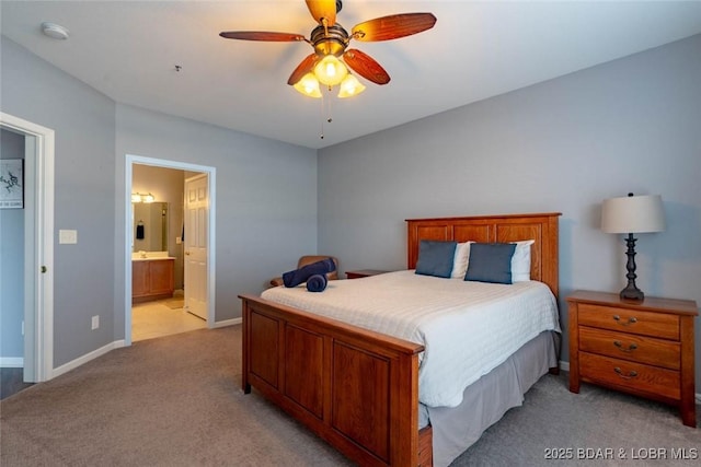 275 Flynn Rd Unit 105, Lake Ozark, MO 65049 - bedroom featuring light carpet, connected bathroom, and a ceiling fan