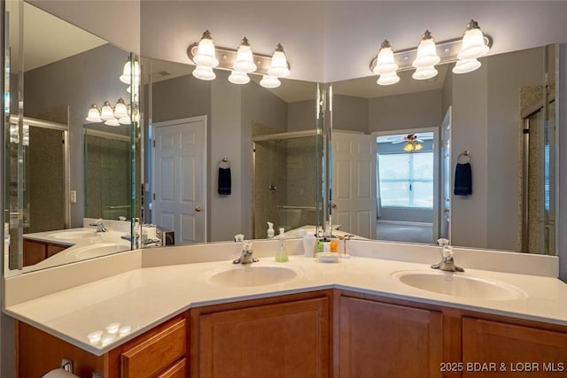 275 Flynn Rd Unit 105, Lake Ozark, MO 65049 - full bathroom featuring a stall shower, double vanity, and ceiling fan