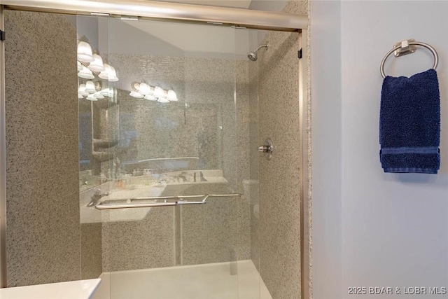 275 Flynn Rd Unit 105, Lake Ozark, MO 65049 - bathroom featuring a shower stall and a chandelier