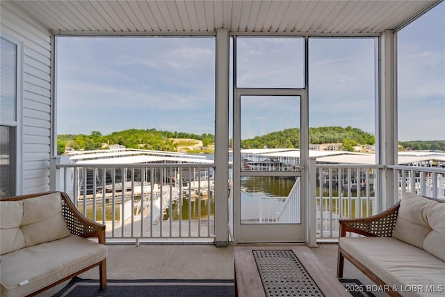 275 Flynn Rd Unit 105, Lake Ozark, MO 65049 - sunroom / solarium featuring a water view and plenty of natural light