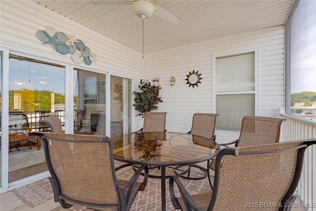 275 Flynn Rd Unit 105, Lake Ozark, MO 65049 - sunroom / solarium with a ceiling fan and outdoor dining space