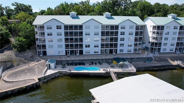 275 Flynn Rd Unit 105, Lake Ozark, MO 65049 - view of apartment building / complex featuring a water view and view of scattered trees