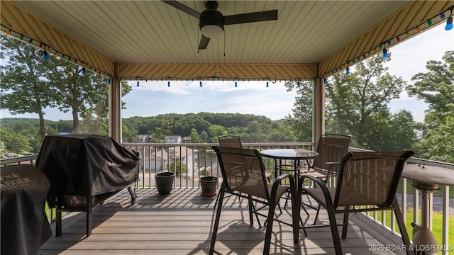 15 Knox Point Cir, Lake Ozark, MO 65049 - wooden terrace with a ceiling fan, outdoor dining space, and area for grilling