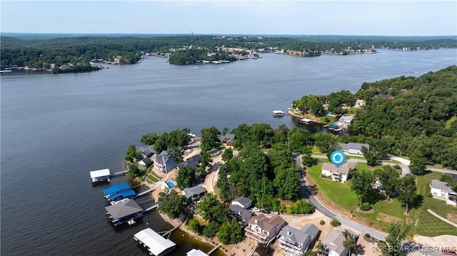15 Knox Point Cir, Lake Ozark, MO 65049 - aerial view of property's location featuring a large body of water and a heavily wooded area