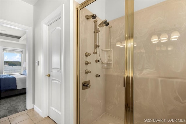 1129 Beacon Pointe Cir, Lake Ozark, MO 65049 - ensuite bathroom featuring a shower stall and tile patterned flooring