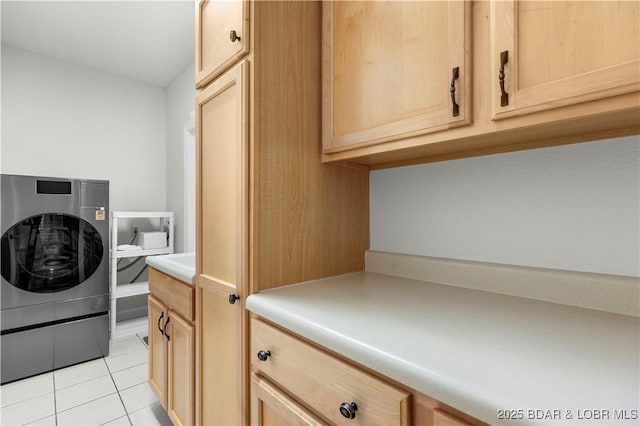 1129 Beacon Pointe Cir, Lake Ozark, MO 65049 - washroom with washer / dryer, cabinet space, and light tile patterned floors