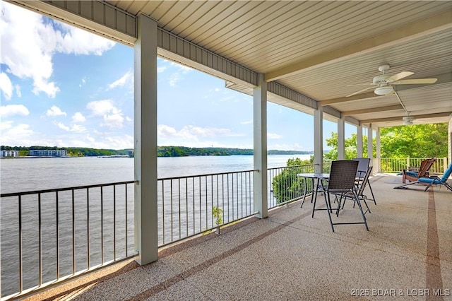 1129 Beacon Pointe Cir, Lake Ozark, MO 65049 - view of patio with a water view and ceiling fan