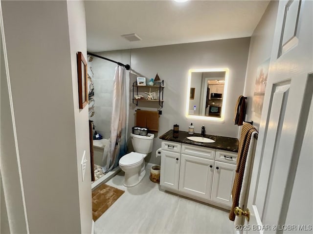 757 Malibu Rd Unit 101B, Osage Beach, MO 65065 - full bathroom with vanity and a stall shower