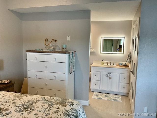 757 Malibu Rd Unit 101B, Osage Beach, MO 65065 - bedroom featuring a sink and connected bathroom
