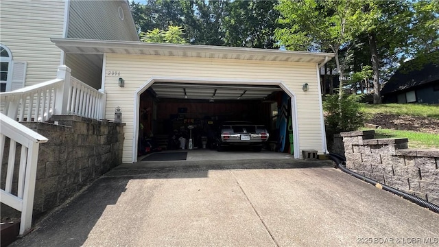 2096 Birchwood Ln, Osage Beach, MO 65065 - garage with concrete driveway