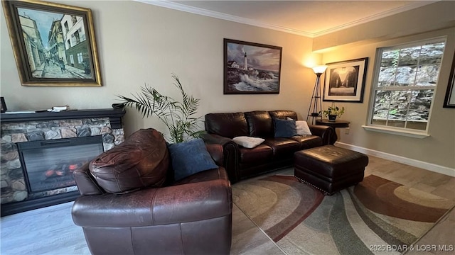 2096 Birchwood Ln, Osage Beach, MO 65065 - living room featuring crown molding and a stone fireplace
